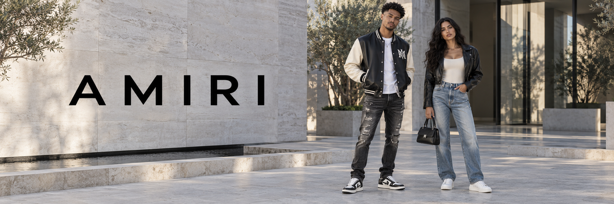 Amiri kleding – man in varsity jack en vrouw in jeans met Amiri tas