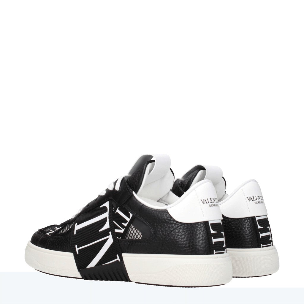 Valentino Garavani Leren sneakers met ronde neus – Zwart / Wit