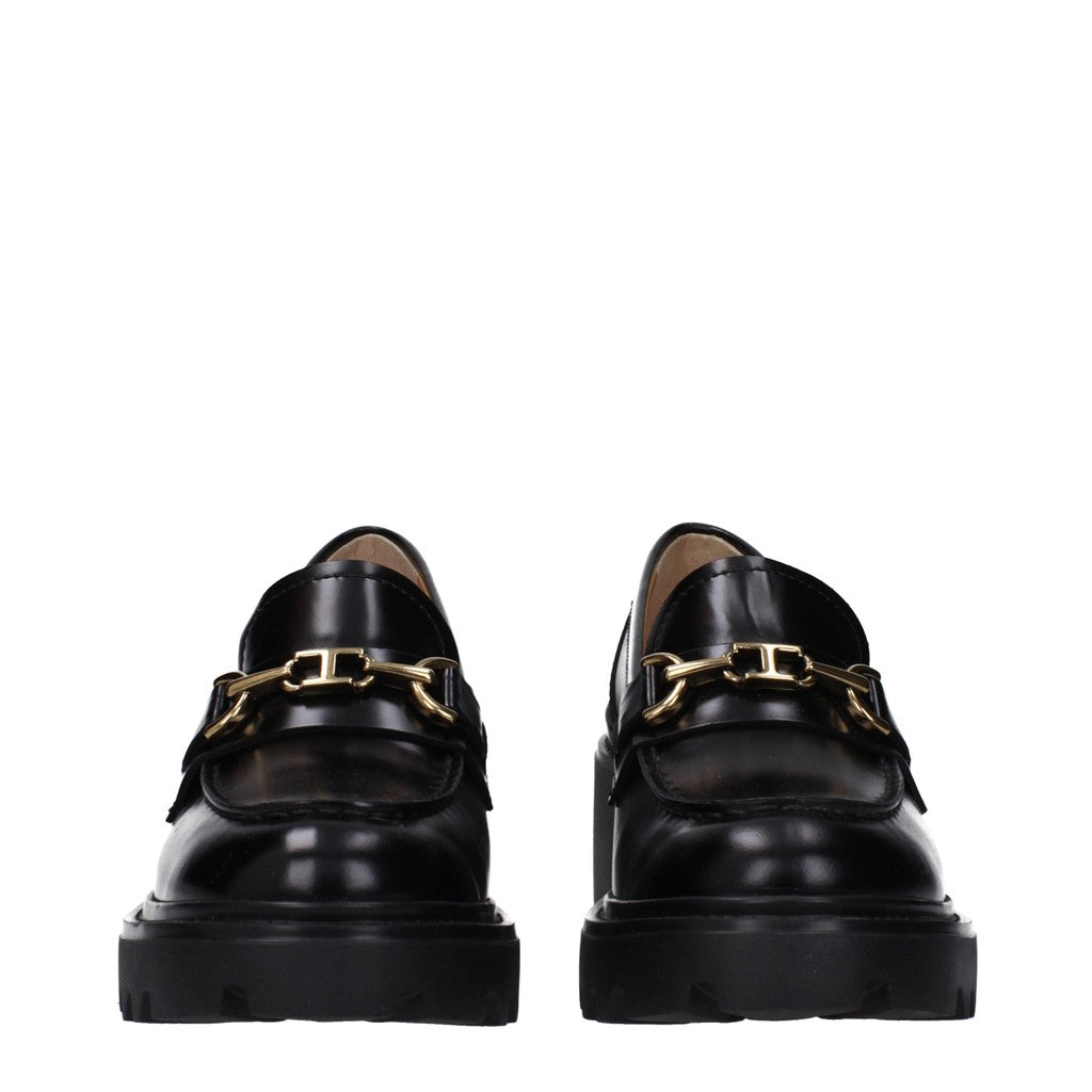 Tod's Leren loafers met hak en profielzool – Zwart